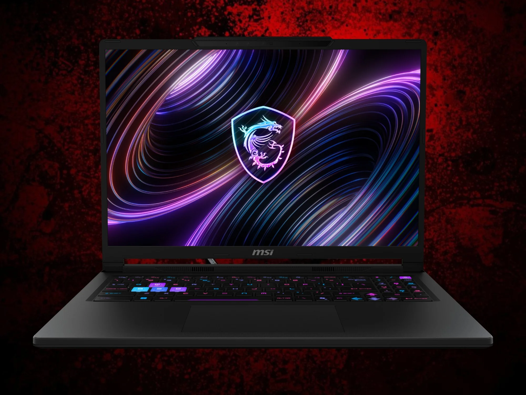 MSI Raider 16 viewed from the front with an RGB keyboard and a gaming display.